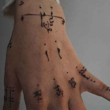 finger tattoos