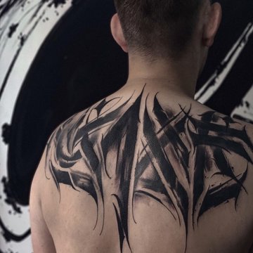 Vyriškos tatuiruotės ant nugaros