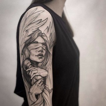 sketch tattoo portrait on the forearm