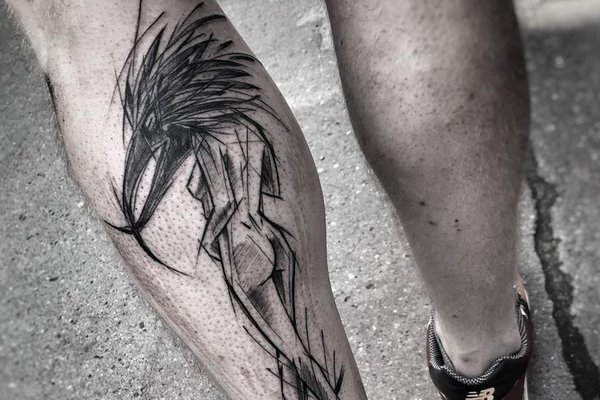 sketch tattoo on a man's ankle