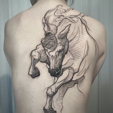 sketch tattoo of a horse on his back